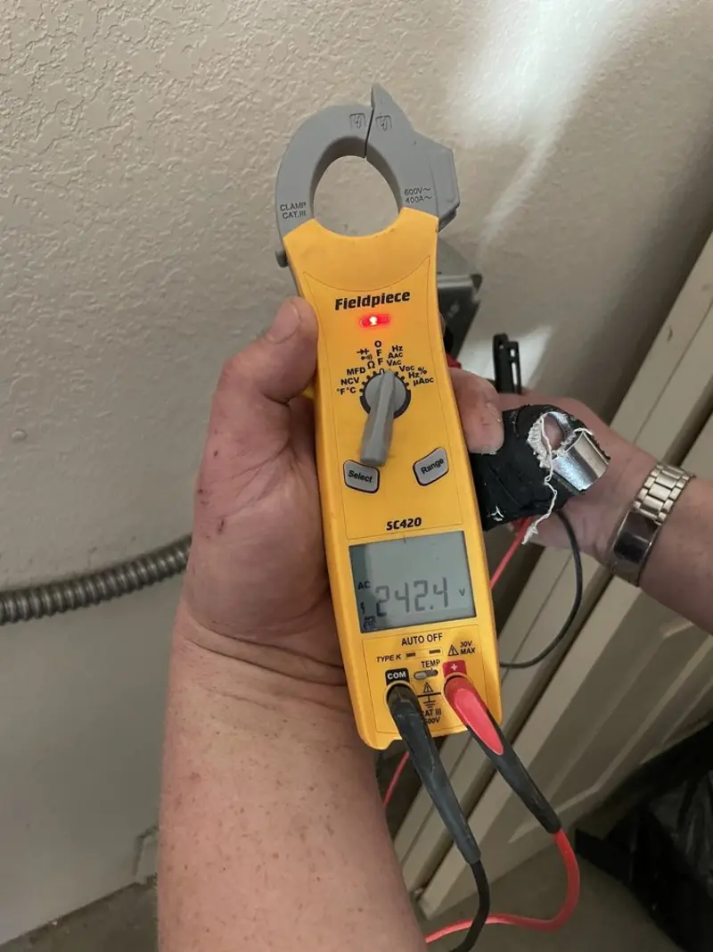 Voltage testing with clamp meter during Hot Tub / Pool Electrical Wiring in Holbrook